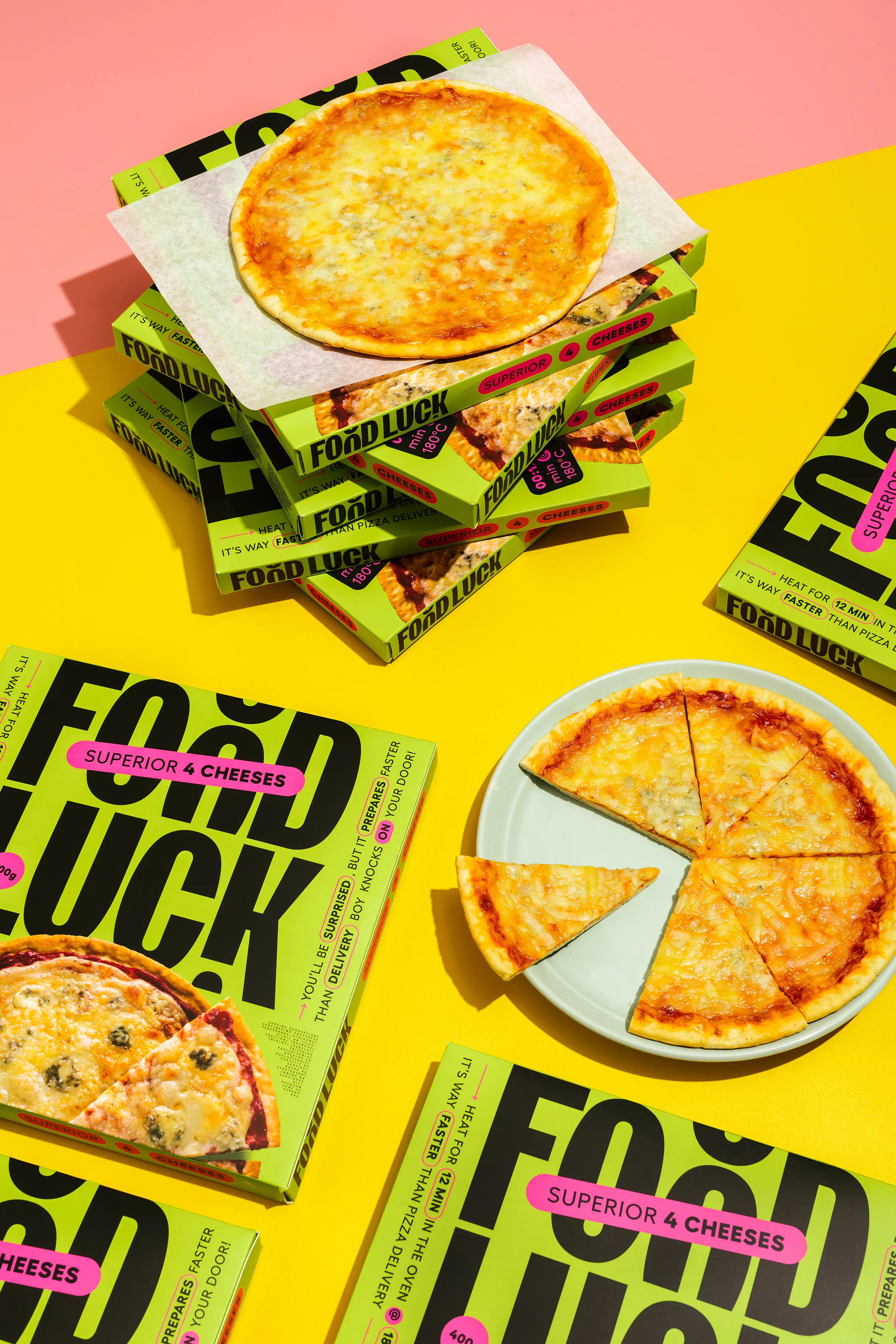 „Food Luck“ šaldytos picos pakuotės geltoname ir rožiniame fone