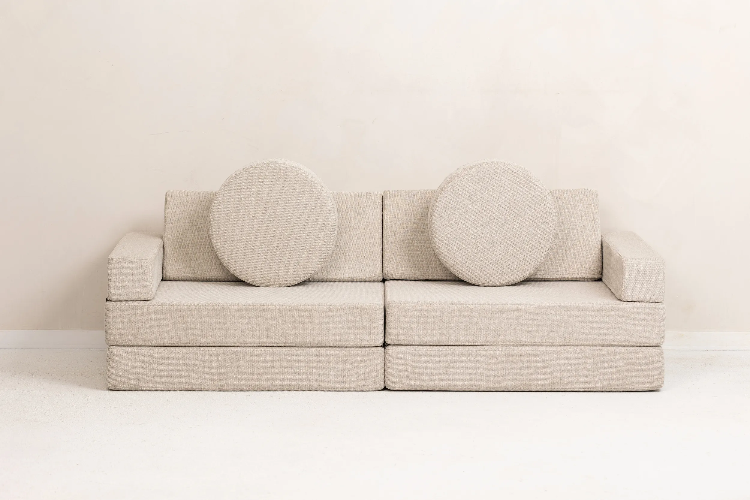 Smėlio spalvos modulinė sofa